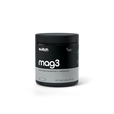 Image of Switch Nutrition's Mag3 supplement container, which is vegan and contains 100% pure Magnesium L-Threonate. The container is sleek with a dark colour scheme and white lettering, indicating 90 veg caps for a total of 60 grams, equivalent to 30 servings.