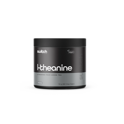 A container of L-theanine supplements with the brand name 'switch' visible. The container is black with white and green labeling and text that reads 'L-theanine, amino acid from green tea, 120 vegan caps.' 