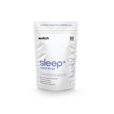 A white package of Sleep+ Nasal Strips by Switch Nutrition, featuring the tagline "a better sleep for a better you." The packaging highlights that the product lifts and opens nasal passages, enhances airflow, reduces snoring, and promotes restful sleep. The package contains 30 strips.