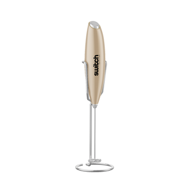 Switch Nutrition Whiz Stick Hand Blender (Beige): A sleek, beige hand blender with the Switch Nutrition logo, displayed in a stand.